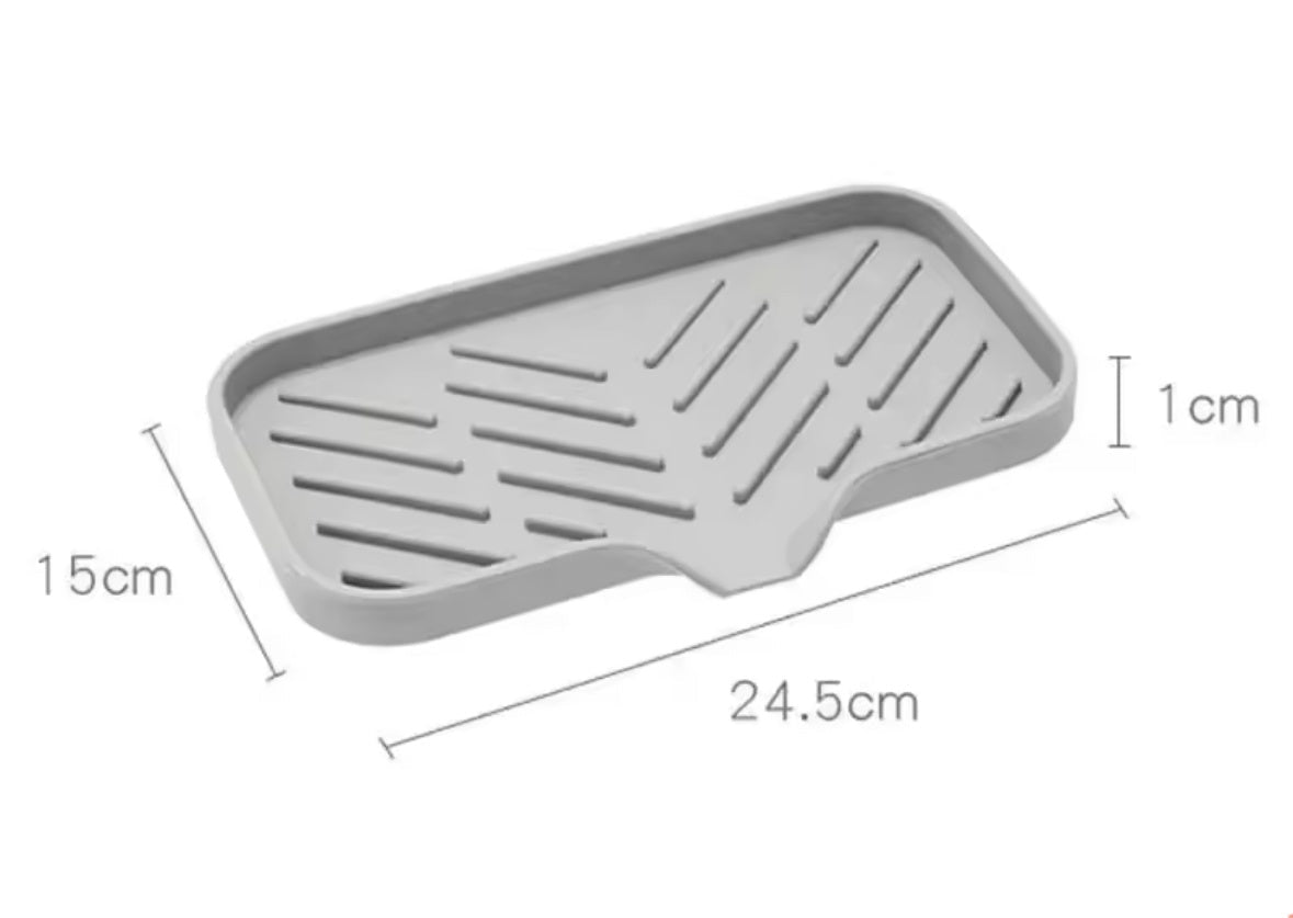 Alfombrilla de silicona anti salpicaduras para canilla con drenaje de agua ideal para mesada de cocina y baño.