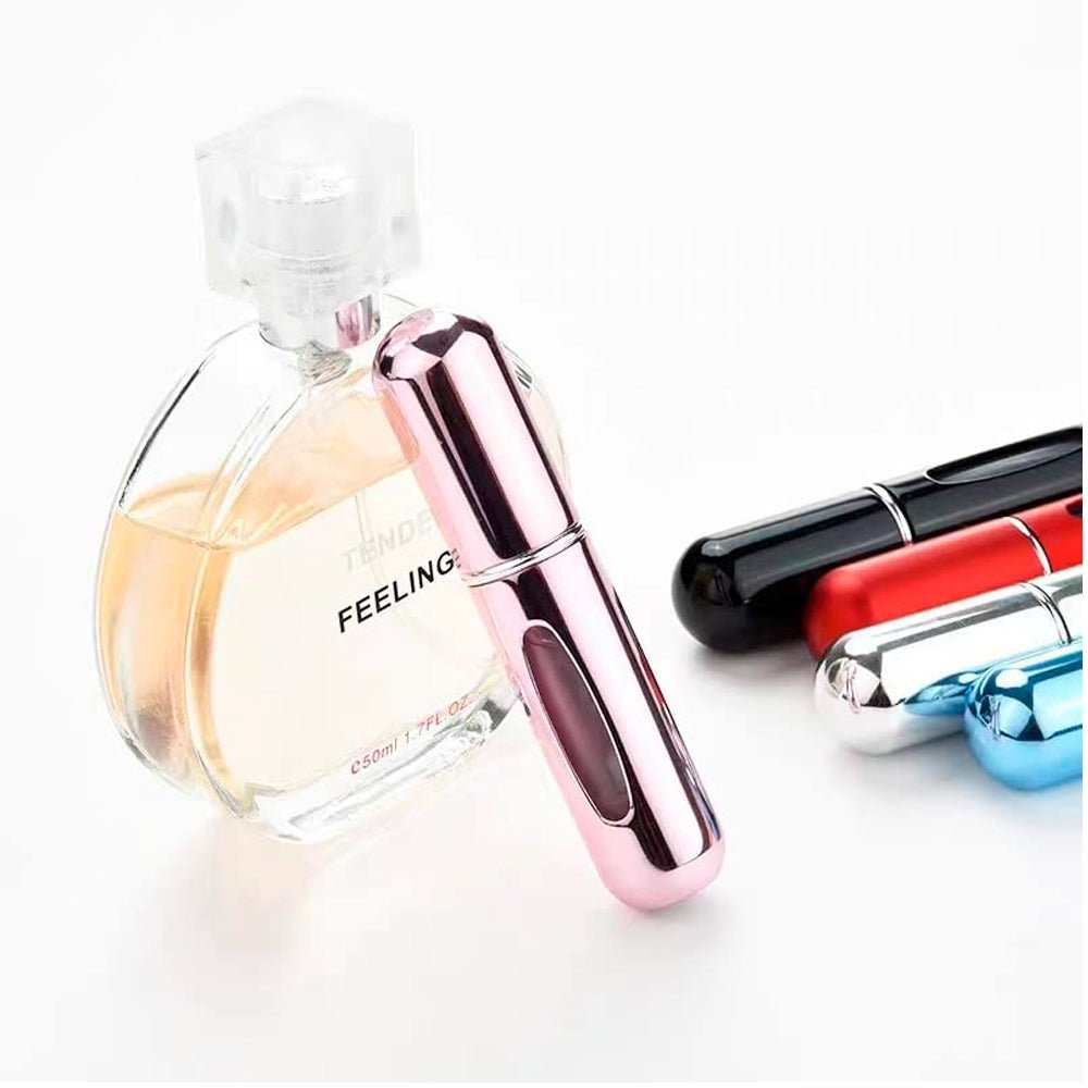 Atomizador porta perfume recargable de 5 ml con cuerpo metálico y ventana para visualizar el nivel del perfume.