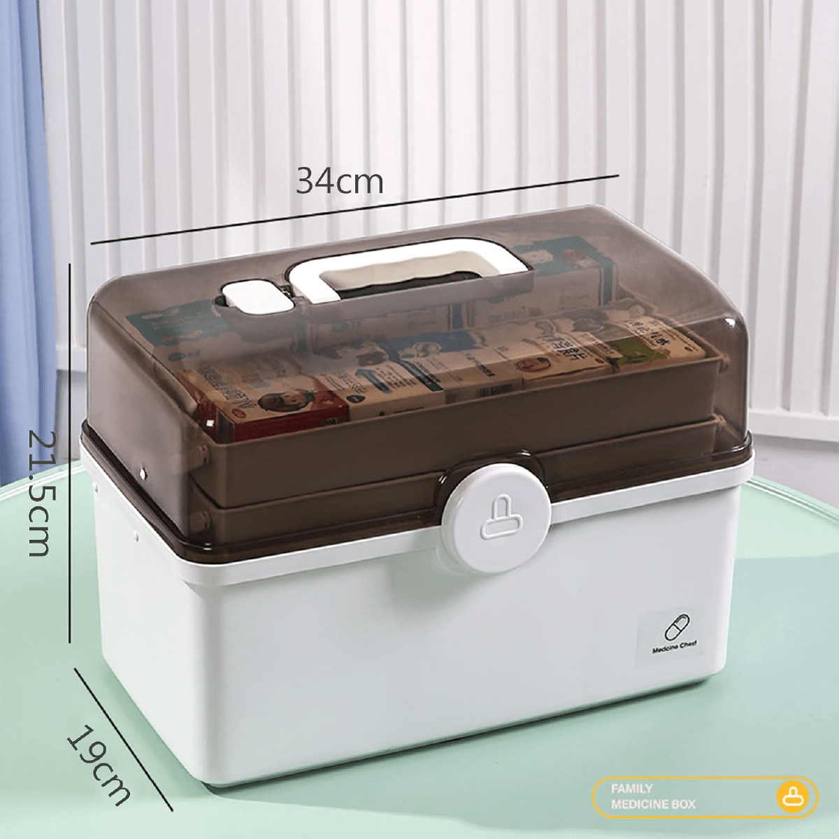Botiquín organizador de medicamentos con 3 compartimentos de plástico resistente y tapa, medidas 34x19x23 cm.