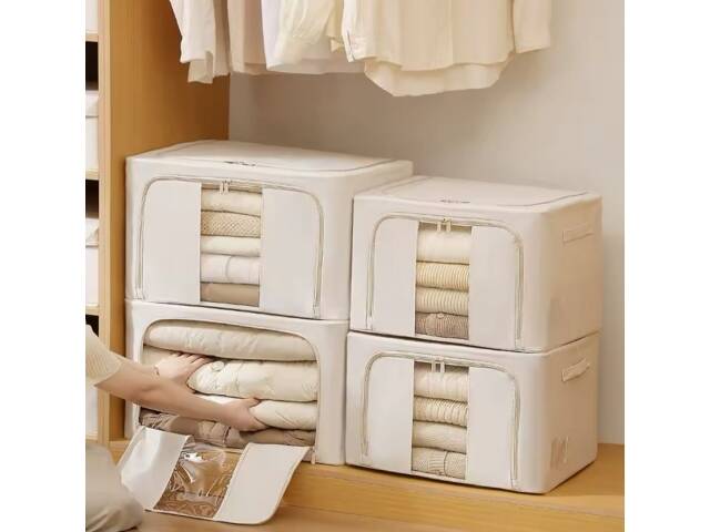Caja organizadora de ropa plegable con estructura metálica, cierre y ventana transparente. Ideal para placard, textiles y almacenamiento del hogar.