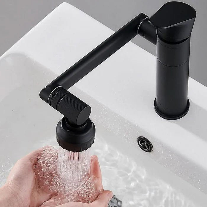 Canilla monocomando articulada 180° para cocina en acero inoxidable con doble chorro y control de agua fría y caliente.