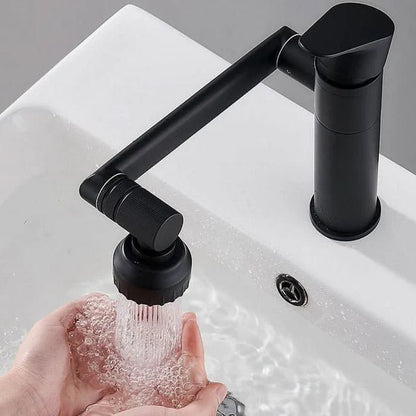 Canilla monocomando articulada 180° para cocina en acero inoxidable con doble chorro y control de agua fría y caliente.