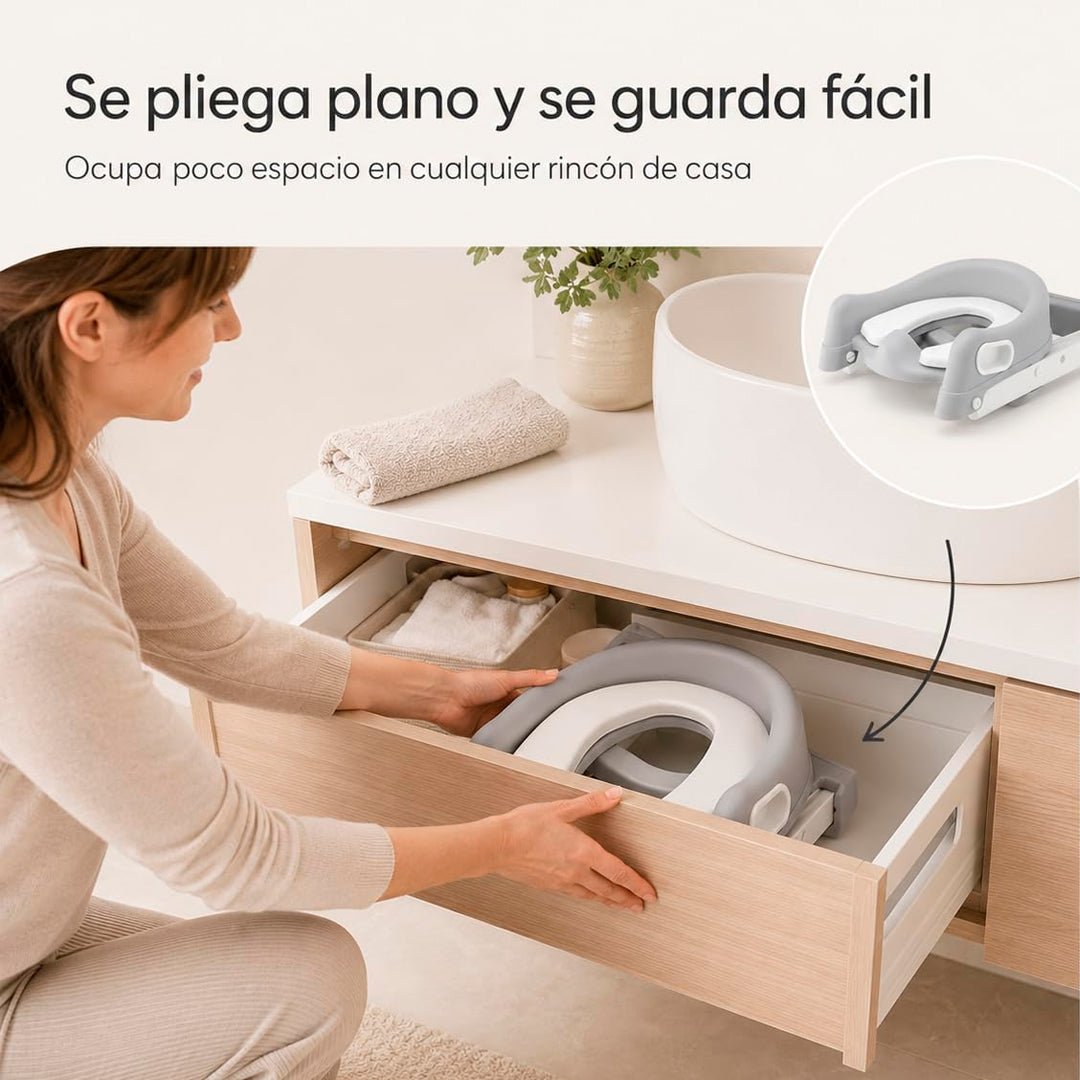Asiento reductor de inodoro infantil con escalera ajustable, respaldo, asas y base antideslizante para niños.