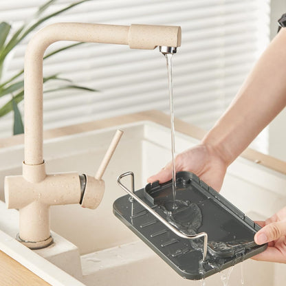 Dispensador de jabón 3 en 1 para cocina con porta esponja y cepillos. Acero inoxidable, drenaje y diseño organizador para fregadero.