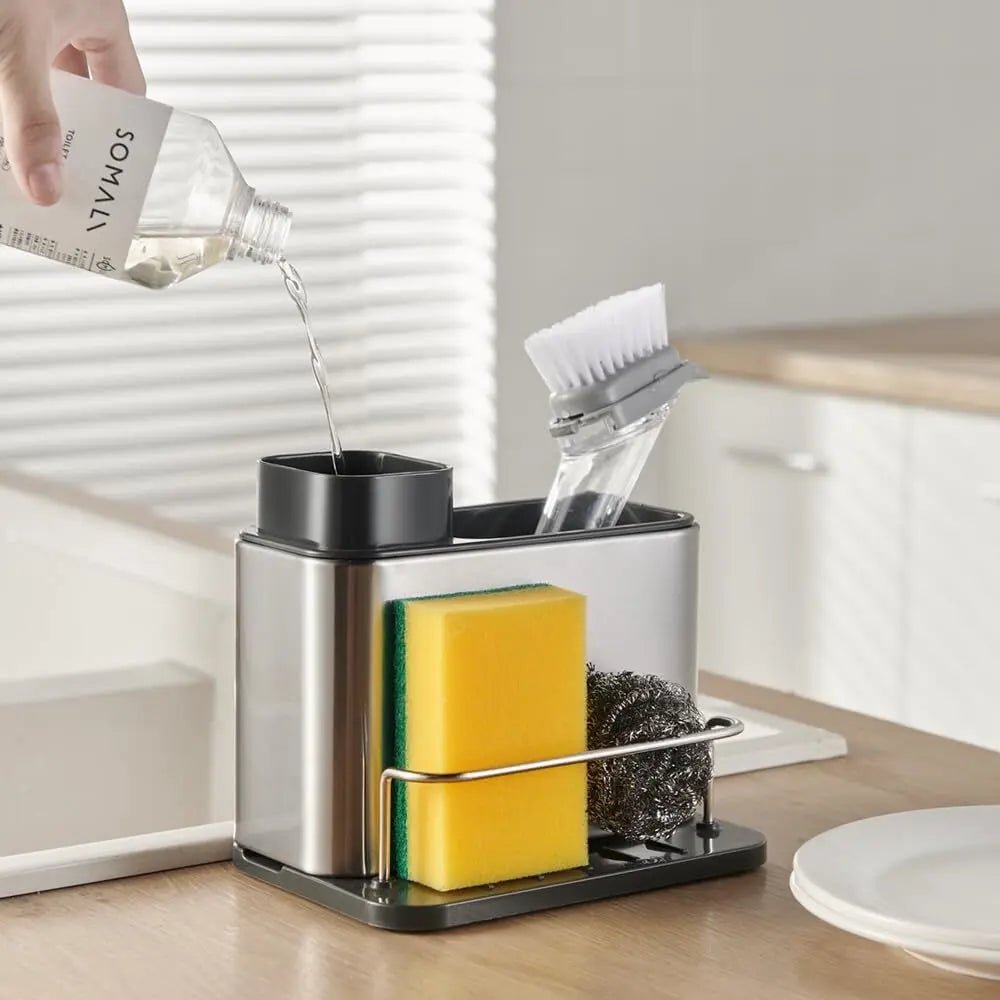 Dispensador de jabón 3 en 1 para cocina con porta esponja y cepillos. Acero inoxidable, drenaje y diseño organizador para fregadero.