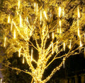 Luces LED lluvia de meteoro con 8 tubos de 30cm y 192 LED para decoración de jardines, eventos y Navidad.