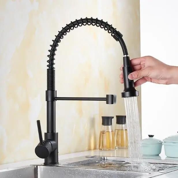 Grifo monocomando de cocina con pico flexible y diseño moderno para controlar agua fría y caliente fácilmente.