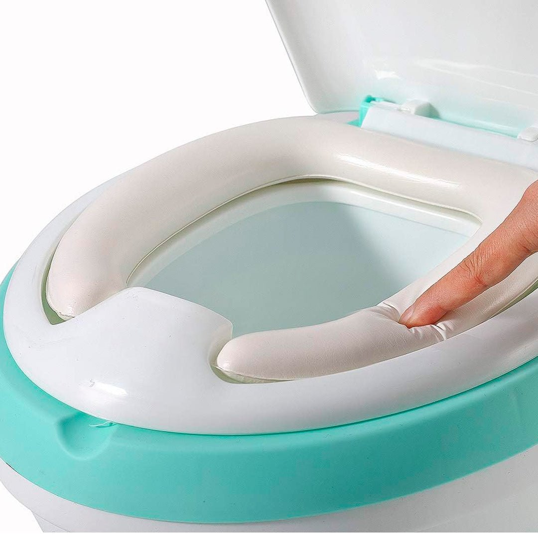 Inodoro infantil de entrenamiento con asiento acolchado, recipiente extraíble y base antideslizante para niños.