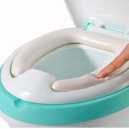 Inodoro infantil de entrenamiento con asiento acolchado, recipiente extraíble y base antideslizante para niños.